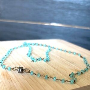 Aquamarine beads on oxidized silver wire. Strong magnetic clasp.  21”